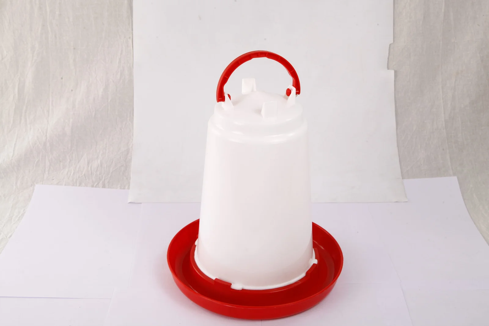 4 litre poultry drinker with handle for easy carrying by Roots Poultry Industries